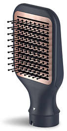 A dark grey hairbrush attachment with a rose gold accent.