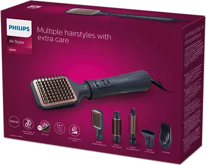 A box of a Philips Air Styler with multiple attachments. Dark colors, product on display.