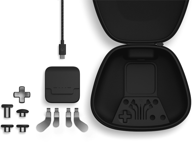 Schwarze Xbox-Controller-Komponenten: Gehäuse, Knöpfe und ein USB-C-Kabel.