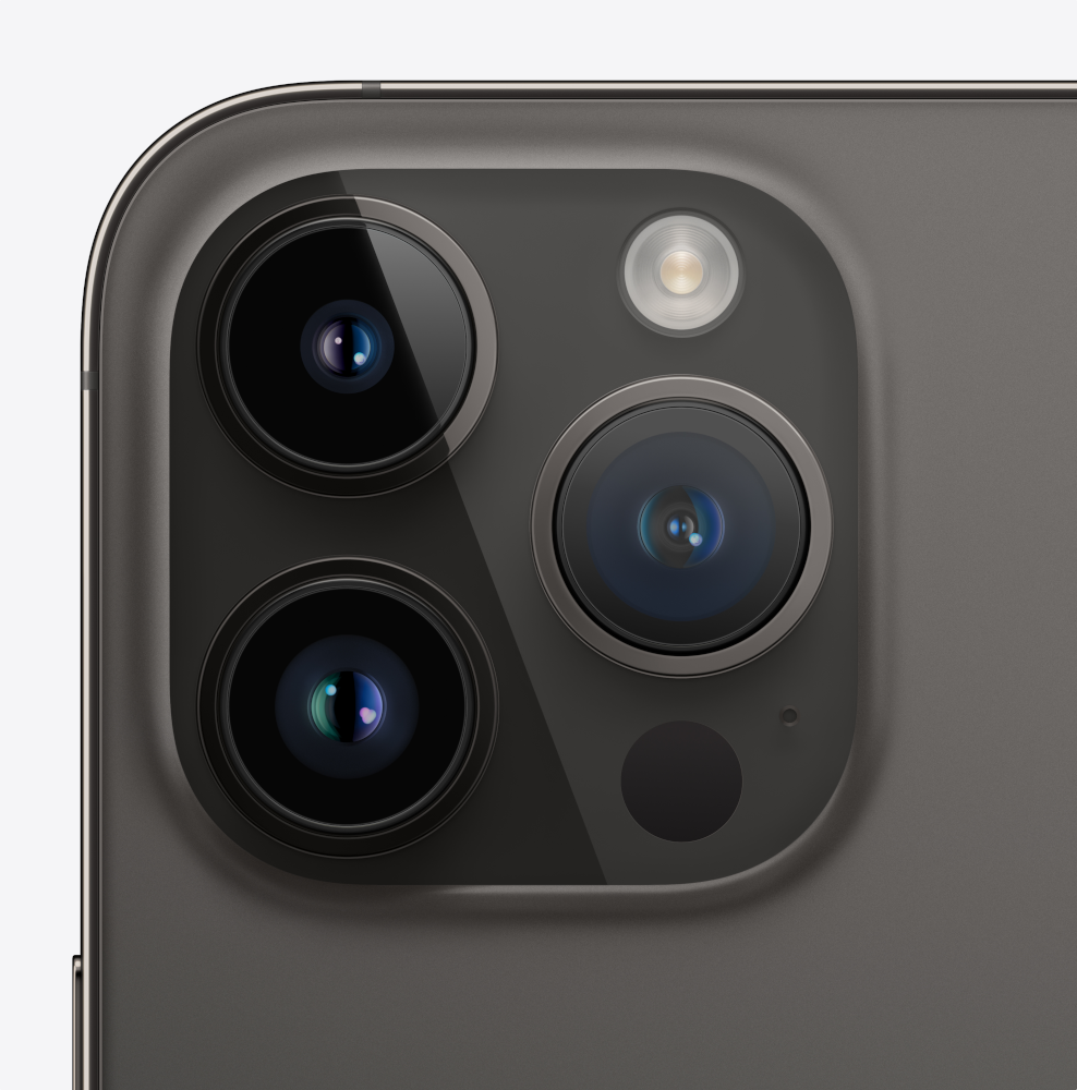 Close-up of a phone's camera array, featuring multiple lenses and a flash.