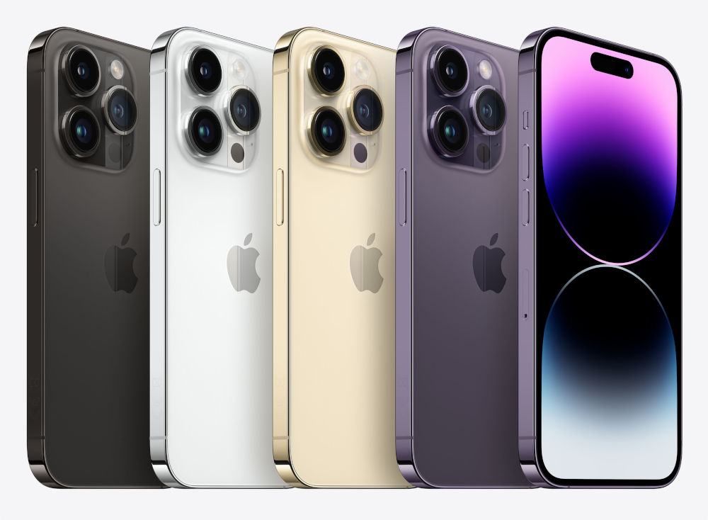 Cinq iPhones colorés alignés ; noir, blanc, or, violet et un écran de téléphone.