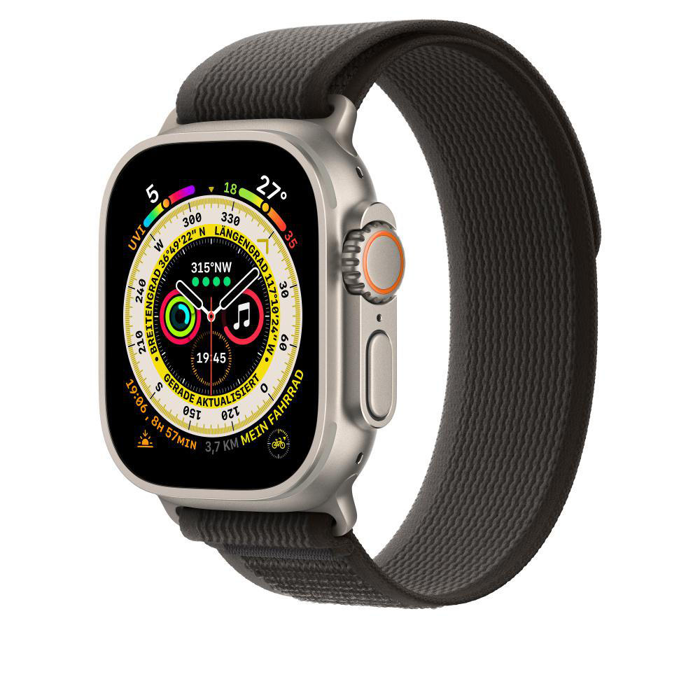 Nahaufnahme einer Smartwatch. Sie zeigt Uhrzeit, Datum, Kompass und andere Funktionen auf schwarzem Grund.
