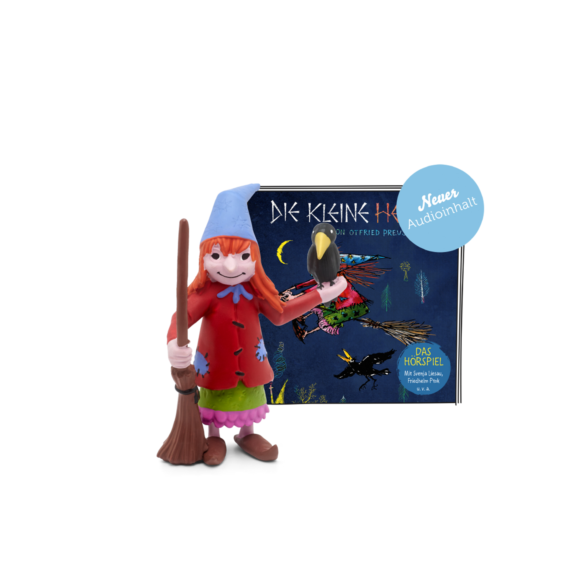 Eine kleine Hexenfigur mit einem Besen, mit einem Buchcover im Hintergrund.