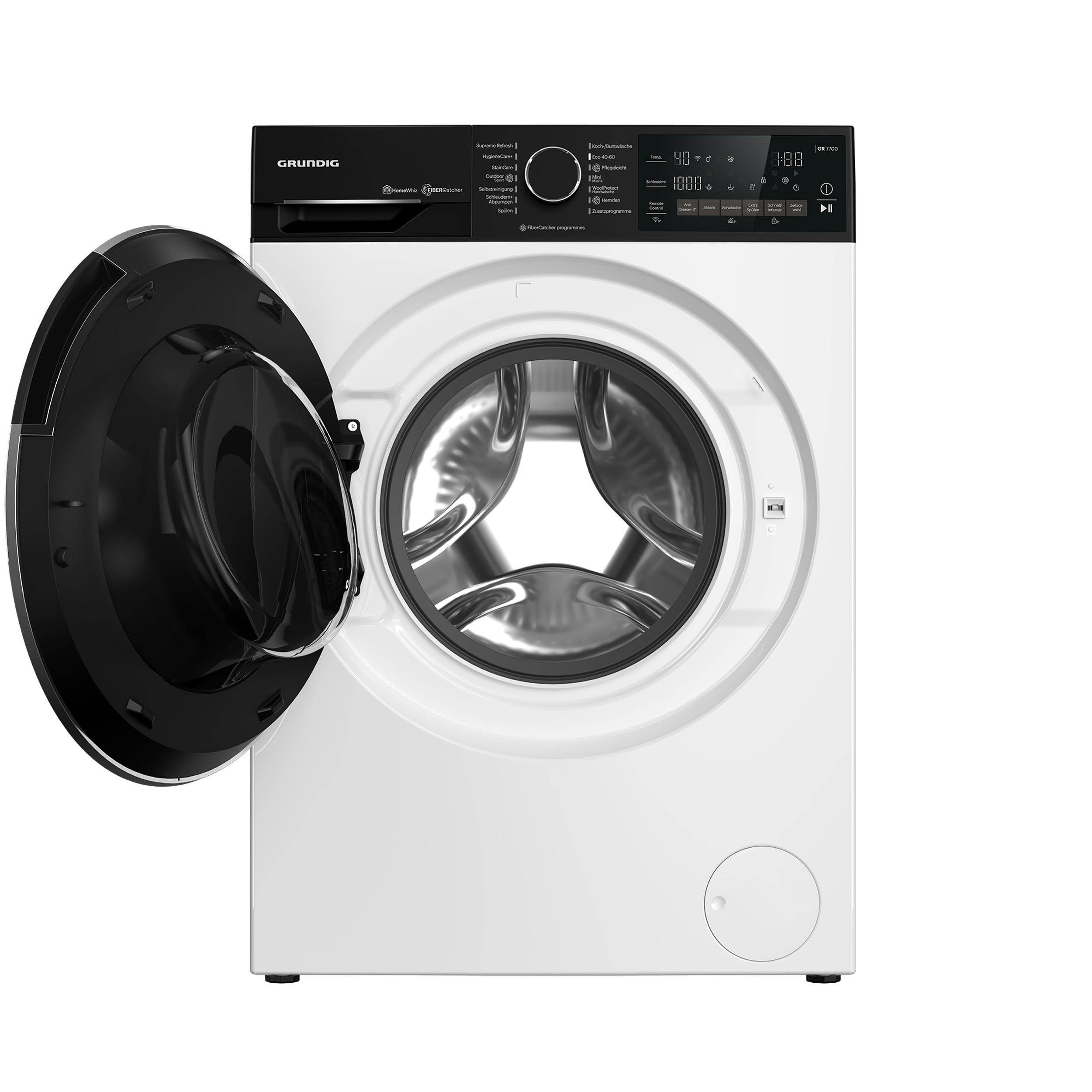Eine weiße Grundig Waschmaschine mit geöffneter schwarzer Tür, die das Innere zeigt.