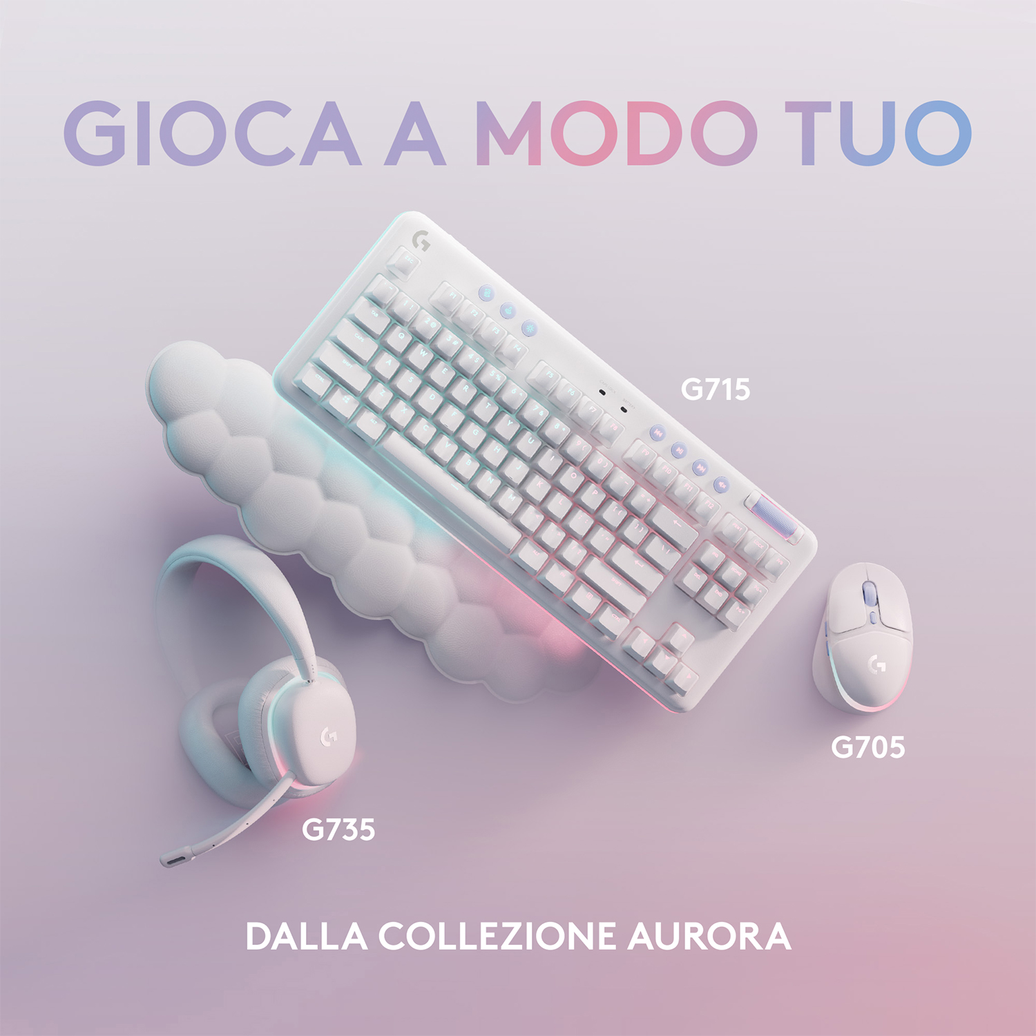 Tastiera, mouse e cuffie da gioco bianchi su sfondo sfumato. Testo: Gioca a modo tuo, dalla collezione Aurora.