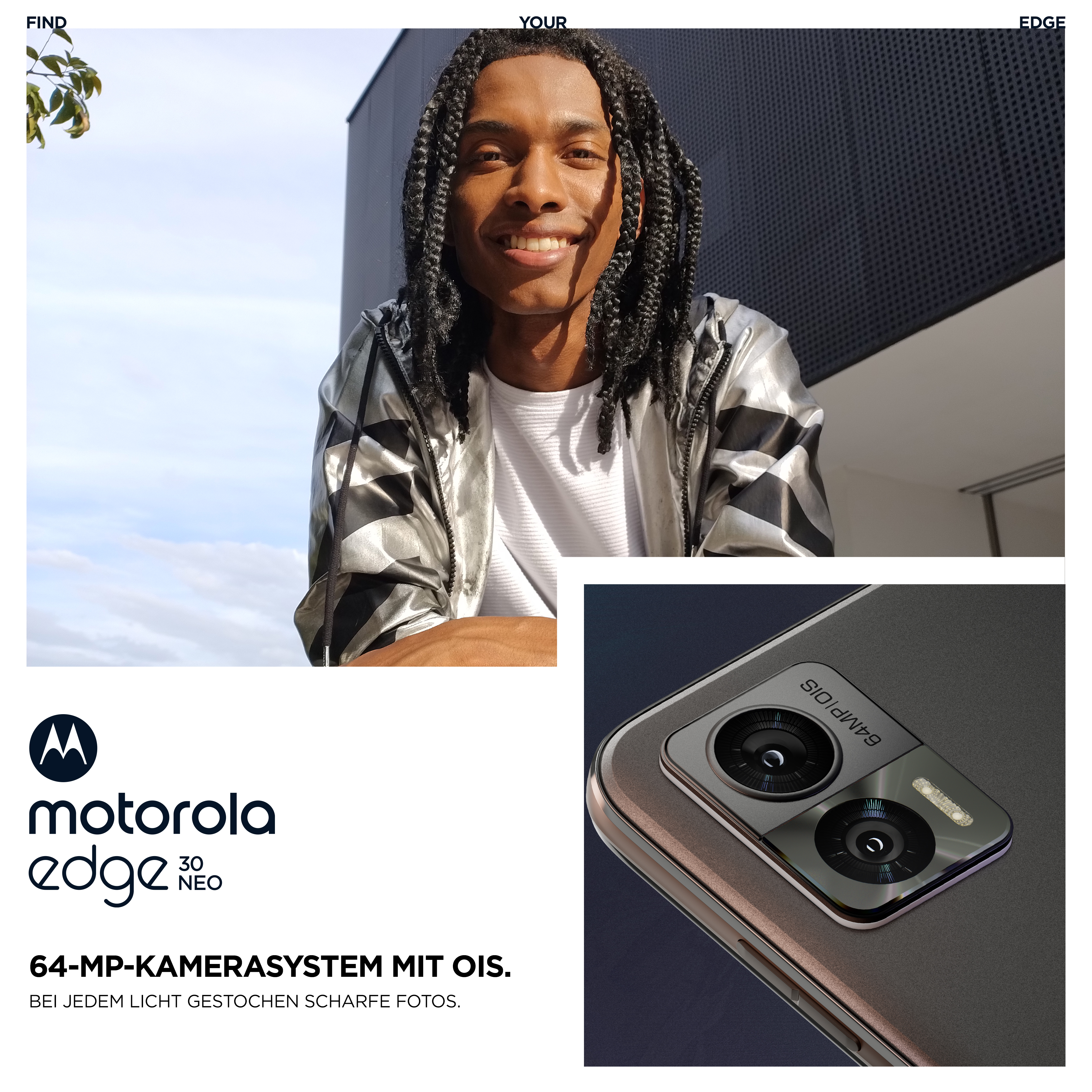 Ein lächelnder schwarzer Mann mit langen Zöpfen. Im Hintergrund ein Motorola Edge 30 Neo-Telefon und Kameradetail.