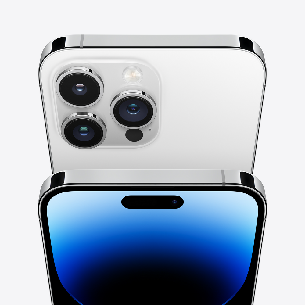Primer plano de un iPhone 14 Pro blanco con su pantalla y módulo de cámara.