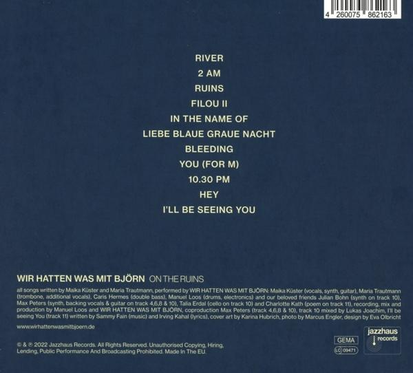 Albumcover mit Songtiteln und Credits auf schwarzem Hintergrund.