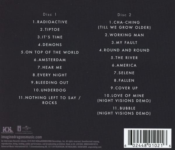 Rückseite einer CD mit Titellisten für zwei Discs. Text ist weiß. Dunkler Hintergrund.