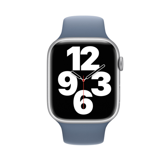 Apple Watch SE con caja plateada y correa azul. La pantalla muestra números blancos grandes sobre un fondo negro.