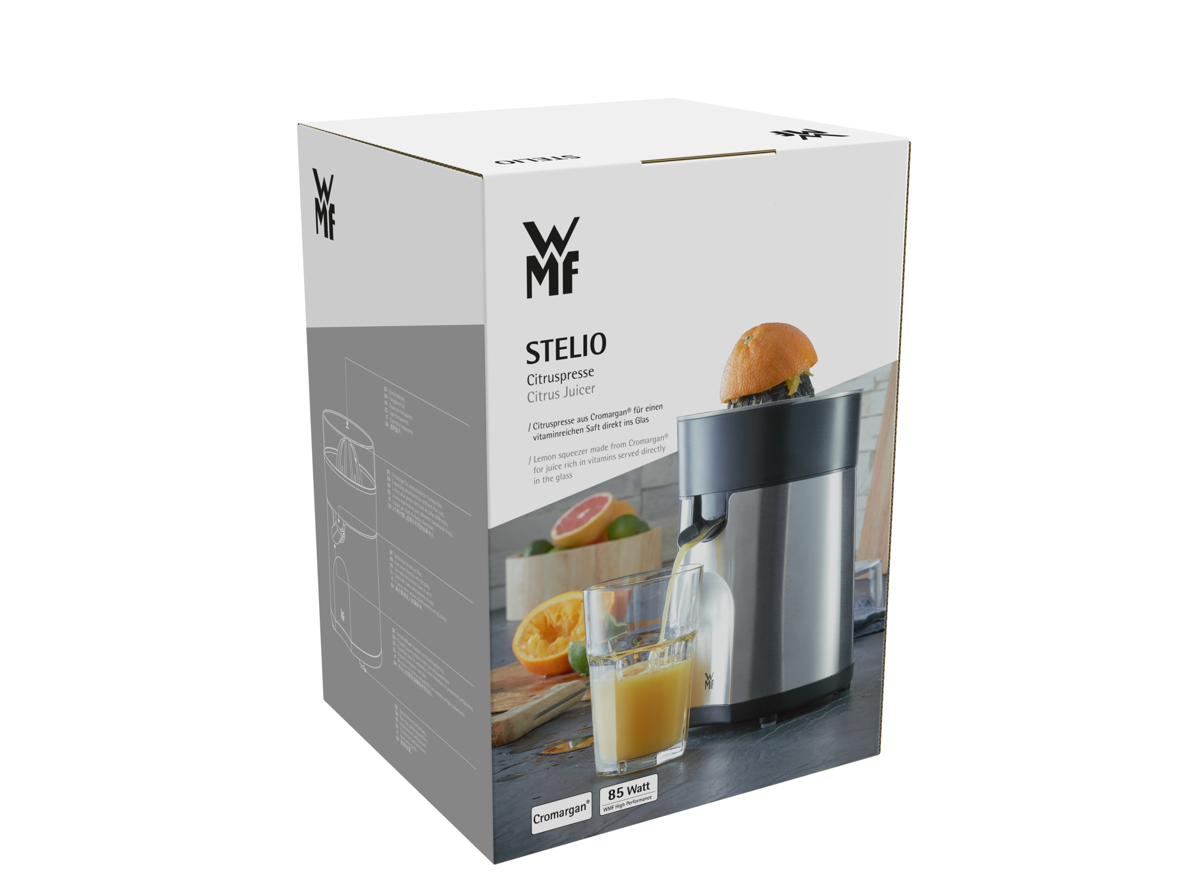 Caja con el logo de WMF, exprimidor y naranja. Jugo de naranja vertiéndose en un vaso. Texto: Exprimidor de cítricos.