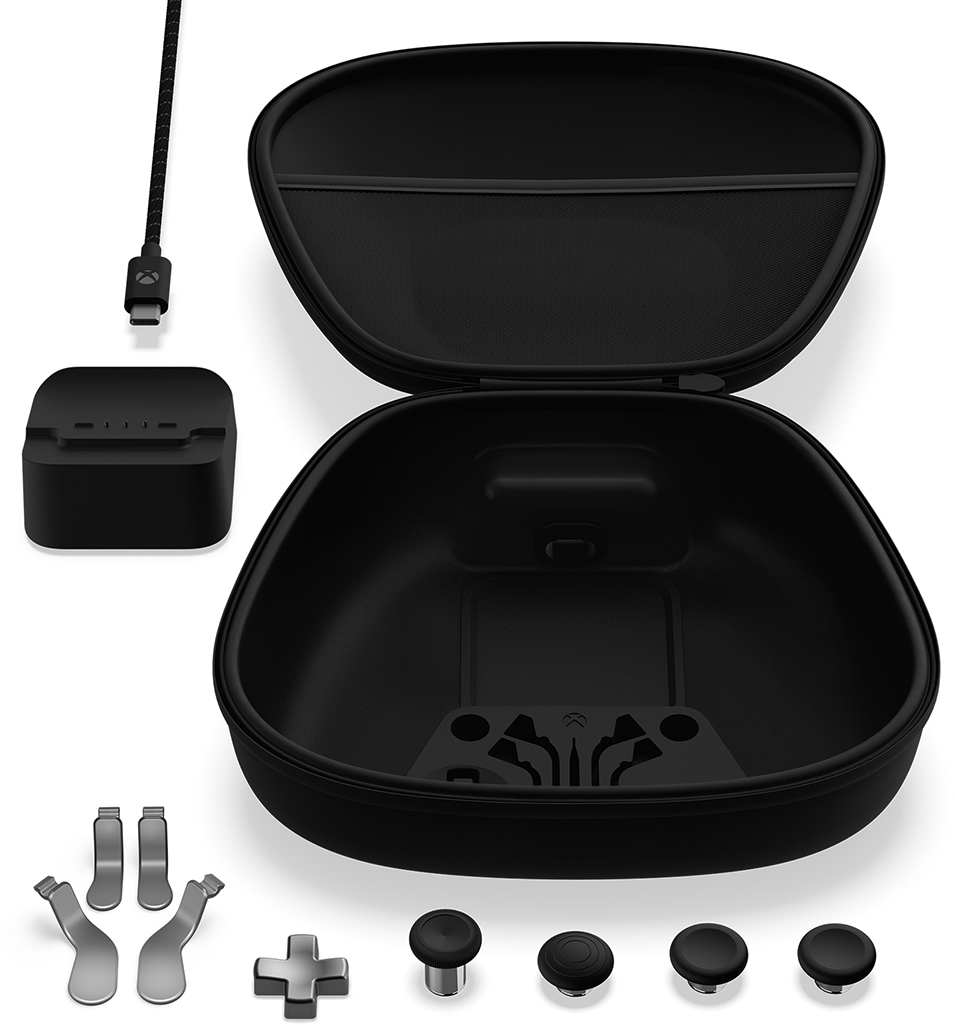 Boîtier noir du contrôleur Xbox Elite Series 2 ouvert, révélant les pièces du contrôleur.
