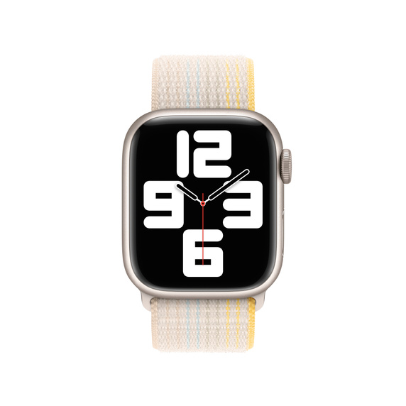 Apple Watch plateado con esfera blanca y números negros. La correa es blanca, amarilla y azul.