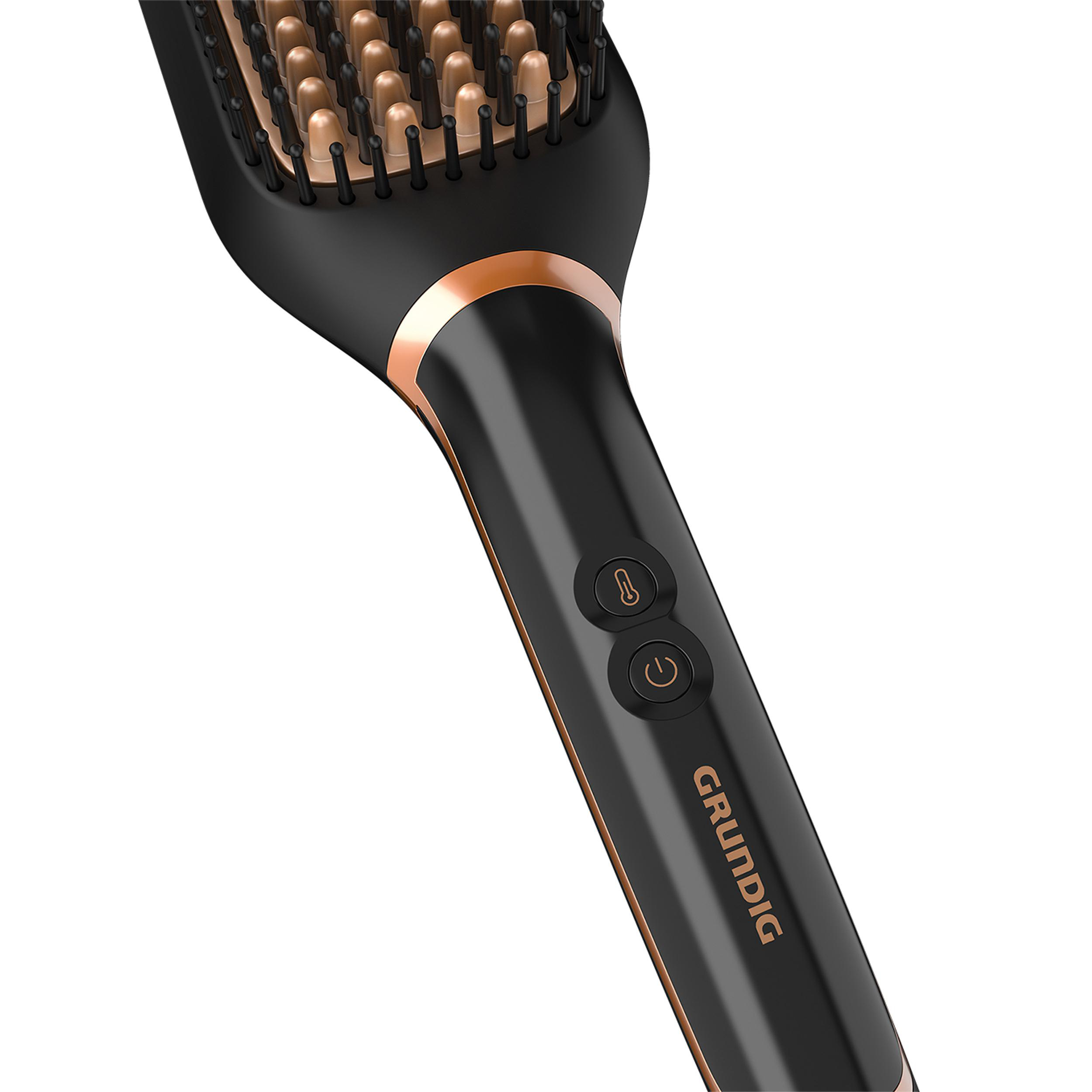 Schwarze und goldene Haarglättungsbürste. Die Marke ist Grundig.