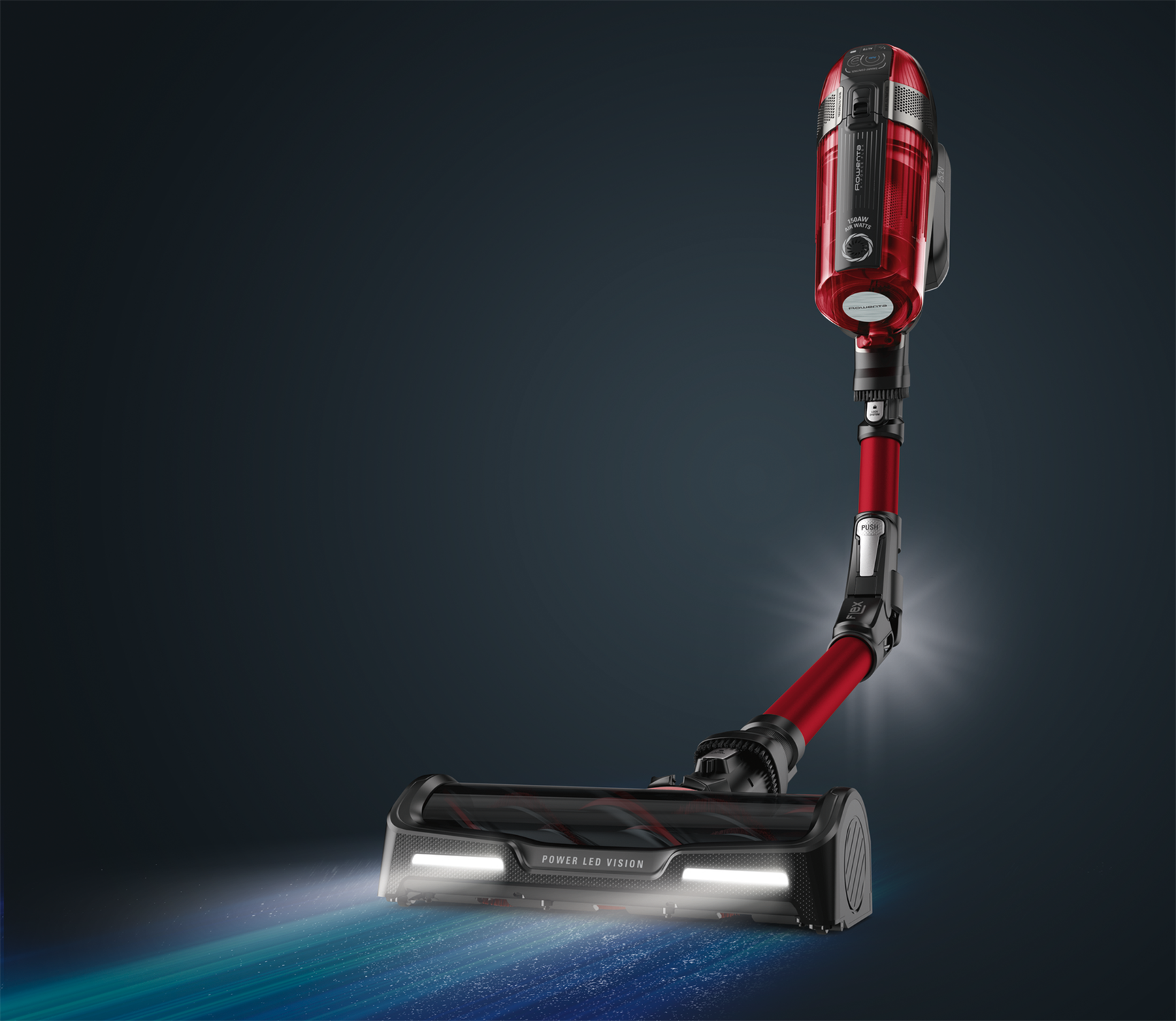 A red and black cordless vacuum cleaner. The vacuum is on a dark blue background.