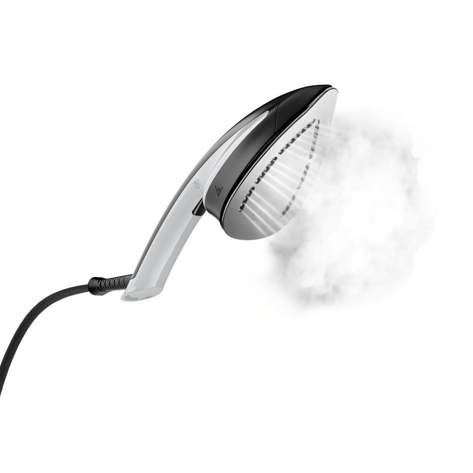 A white and black clothes steamer emitting steam.