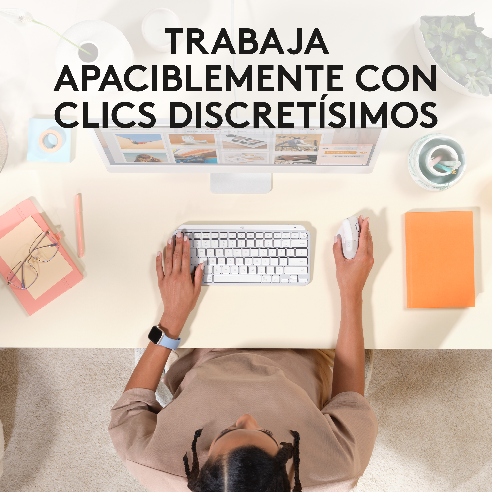 Una persona usando teclado y mouse en un escritorio. El texto dice, 'Trabaja apaciblemente...'