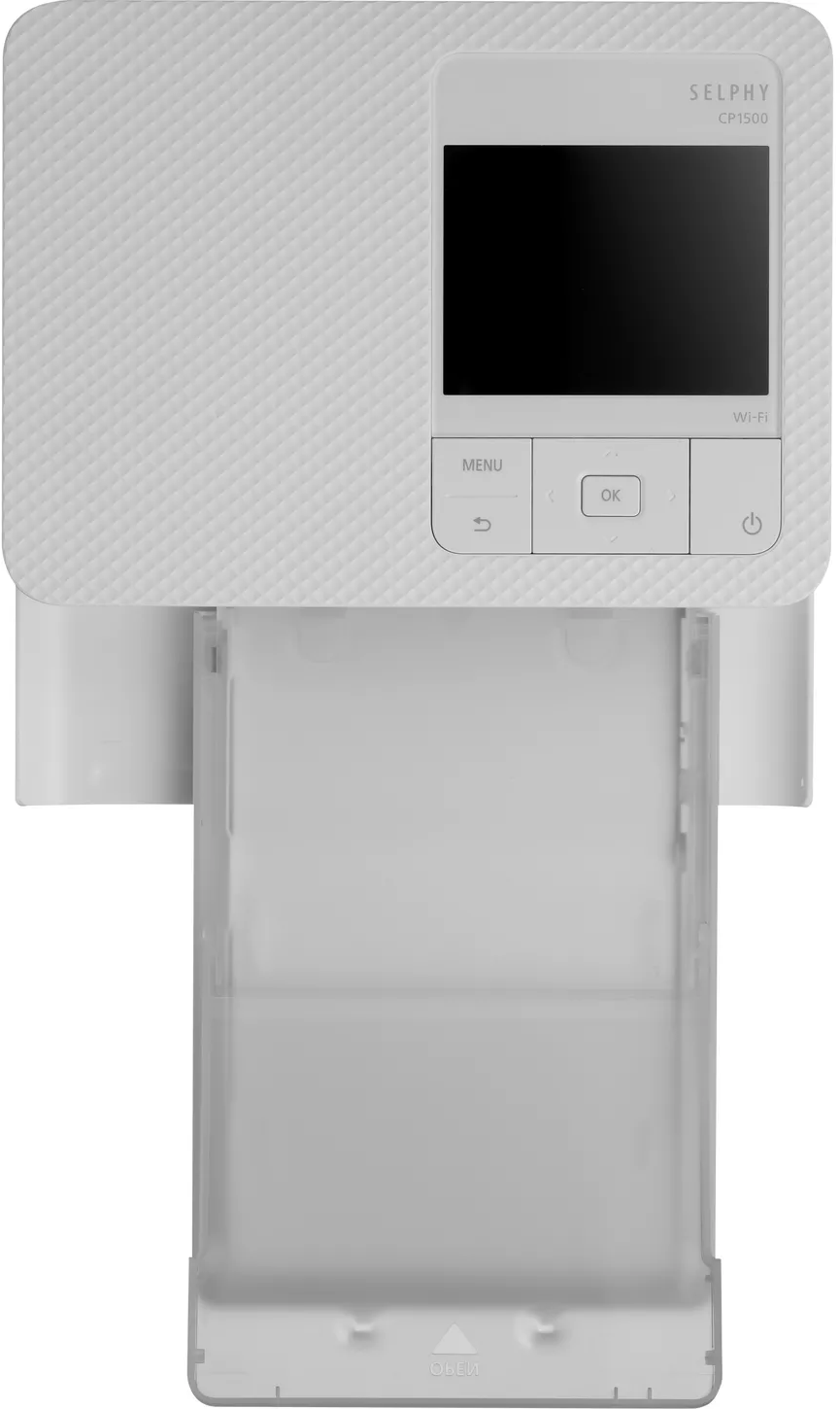 Stampante SELPHY CP1500 bianca con vassoio carta estratto. Schermo con pulsanti menu e accensione.