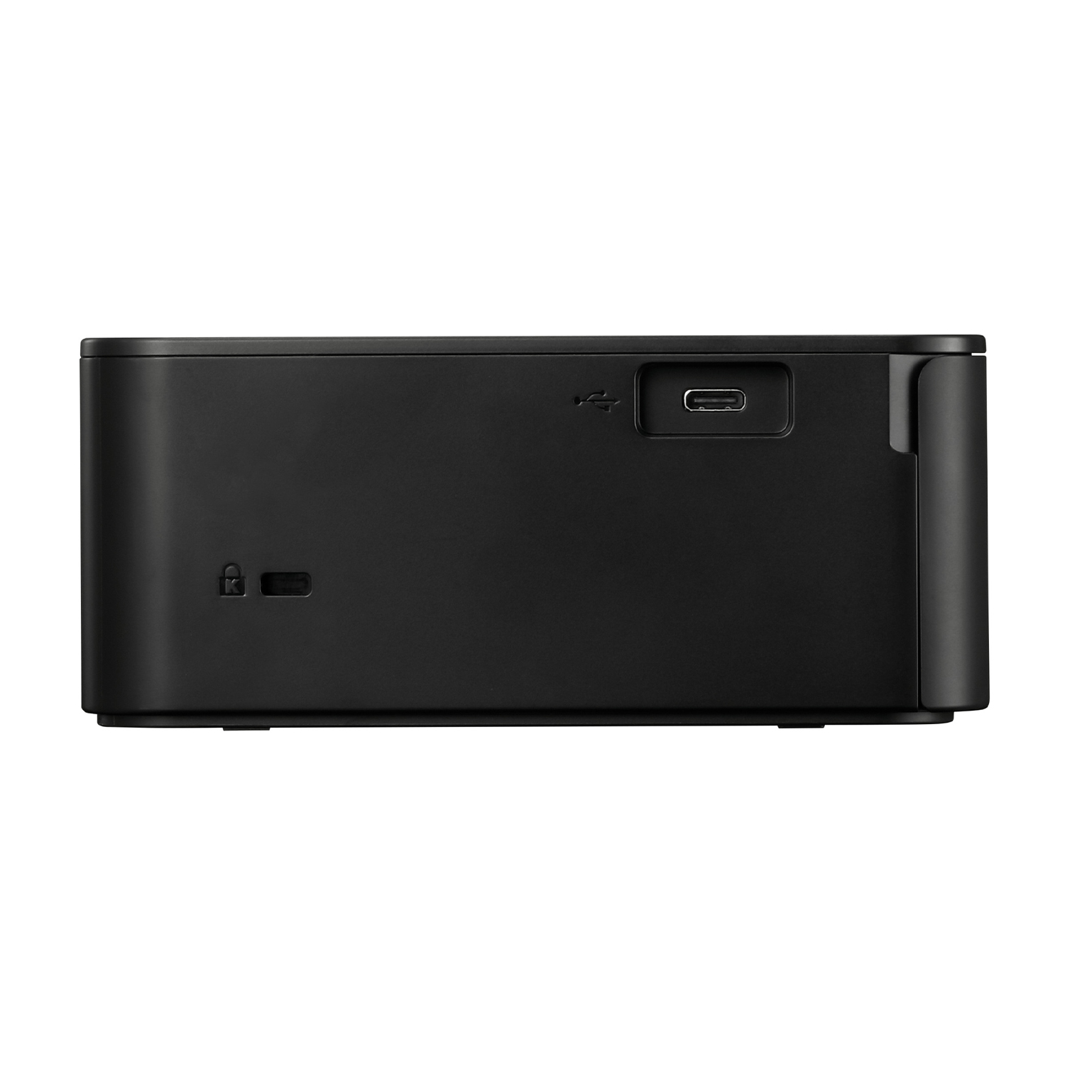 Dispositivo nero, forse un hub o docking station, porta USB-C visibile.