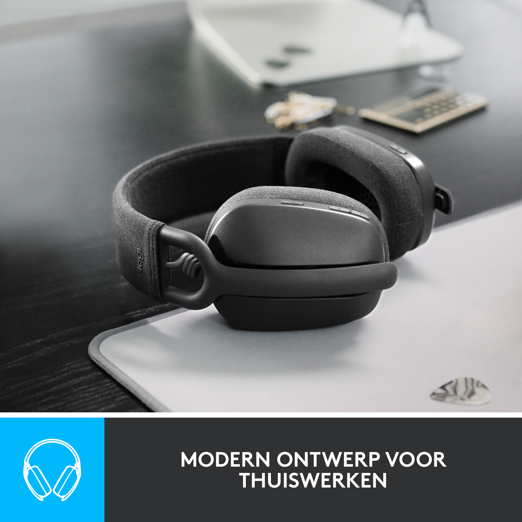 Black headphones on a desk, with text about home office.