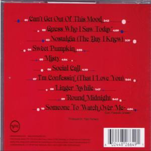 Rückseite einer CD-Hülle mit Titellisten und einem Barcode. Roter Hintergrund mit weißen und blauen Akzenten.