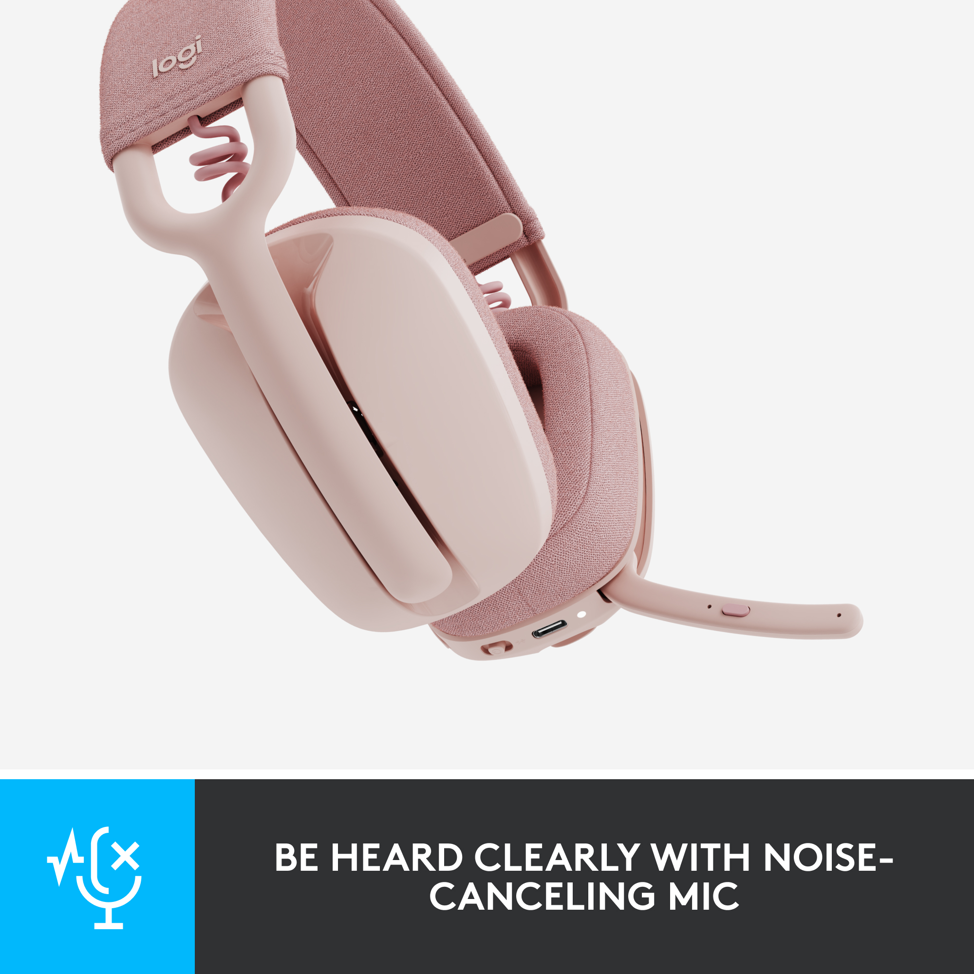 Ein rosa Headset mit Mikrofon. Der Text sagt, dass man mit einem geräuschunterdrückenden Mikrofon klar gehört wird.