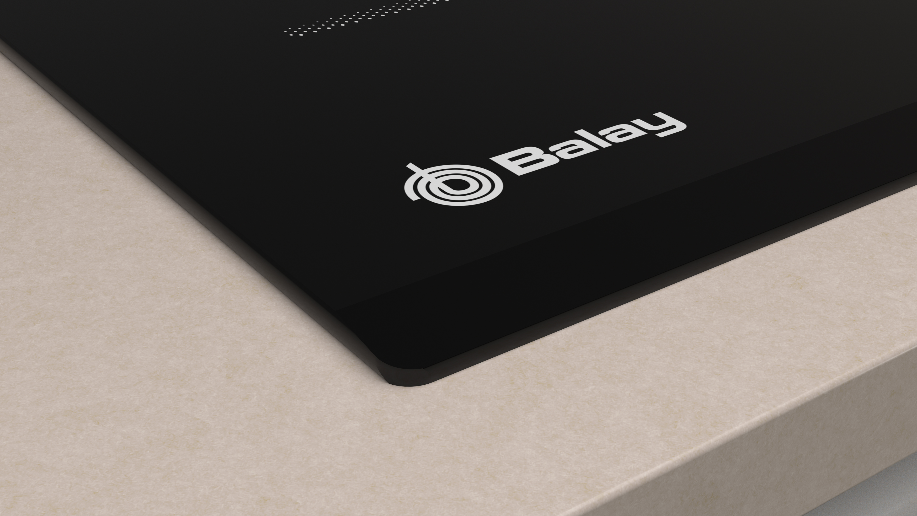 Placa de inducción Balay negra sobre superficie beige.
