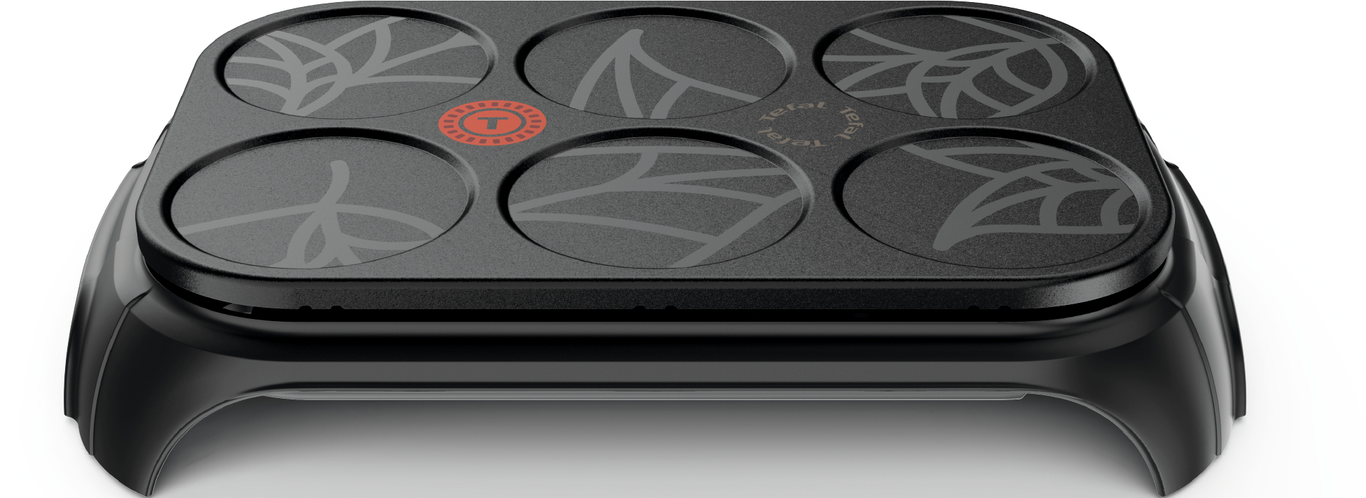 Plaque de cuisson noire avec six zones de cuisson circulaires. Logo rouge 'Tefal'.