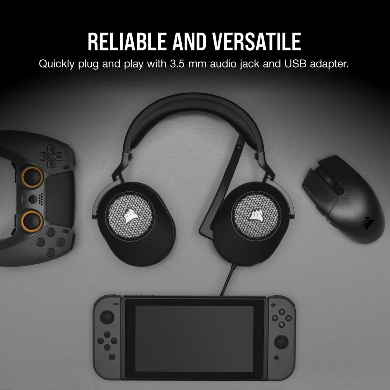 Configuración de juego con controlador, auriculares, ratón y consola Switch sobre una superficie gris.