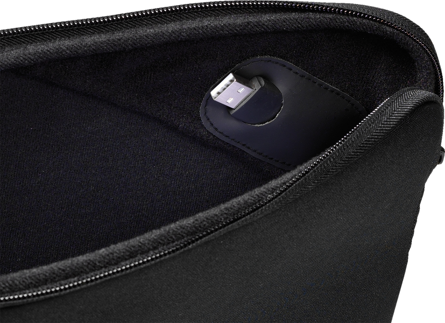 Inside a black carrying case, a USB-C cable is visible.