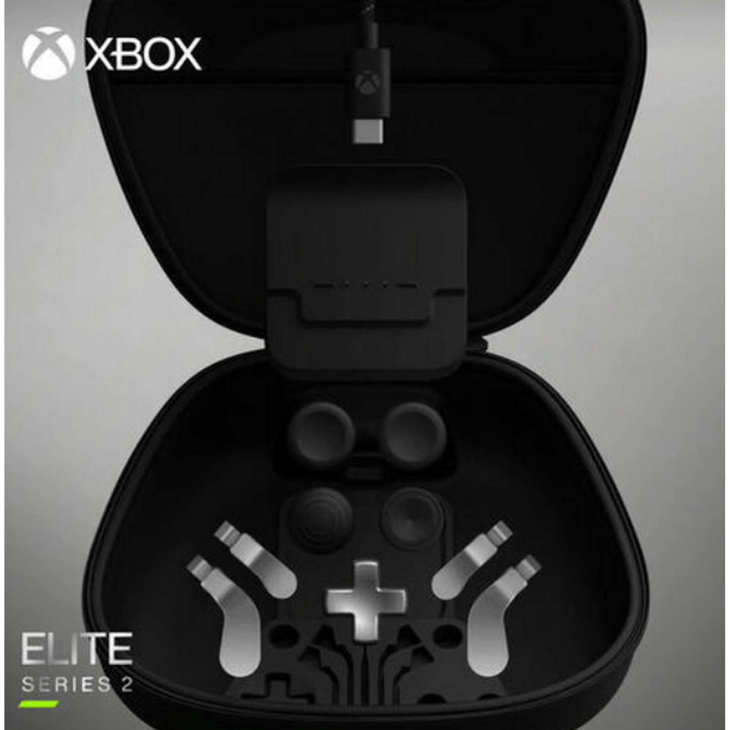 Kit de accesorios para mando inalámbrico Xbox Elite Series 2 en color negro y plata, con funda rígida de transporte, base de carga, cable USB-C y piezas intercambiables para Xbox Series.