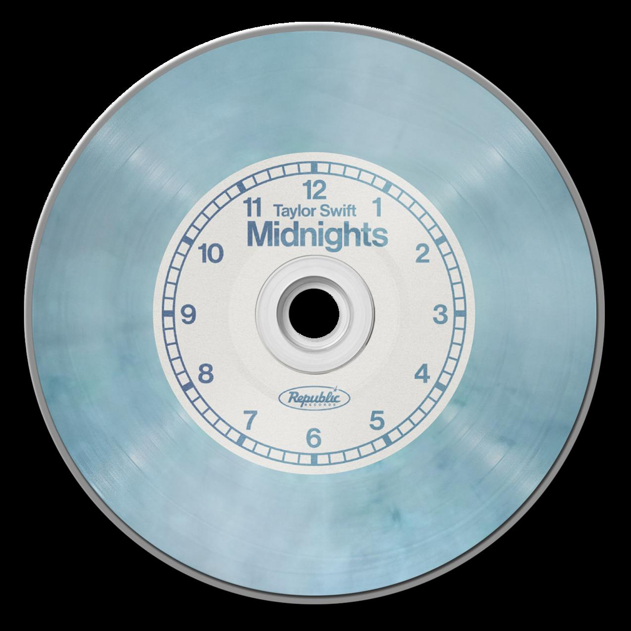 Eine hellblaue CD mit einem Zifferblatt-Design-Label, auf dem "Taylor Swift Midnights" steht, und einem schwarzen Hintergrund.