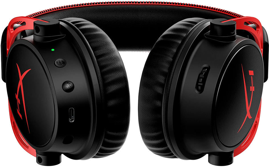 A black and red gaming headset, showing earcups, headband, and controls.