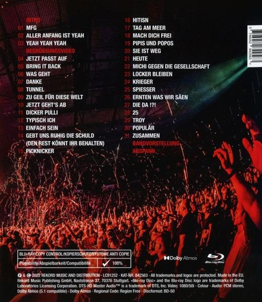 Blu-ray-Cover mit Text, einer Menschenmenge und einer Bühne.