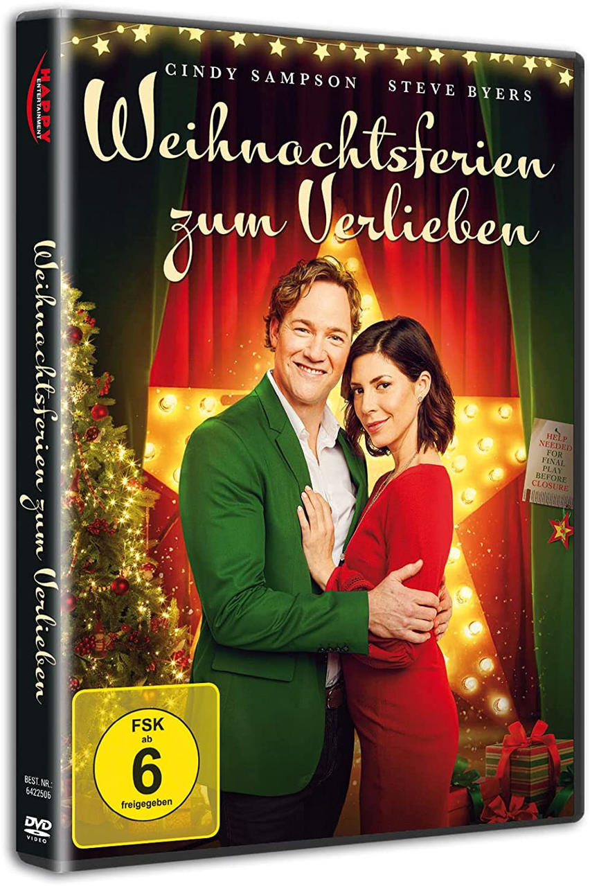DVD-Hülle mit Mann und Frau vor einem Weihnachtsbaum.