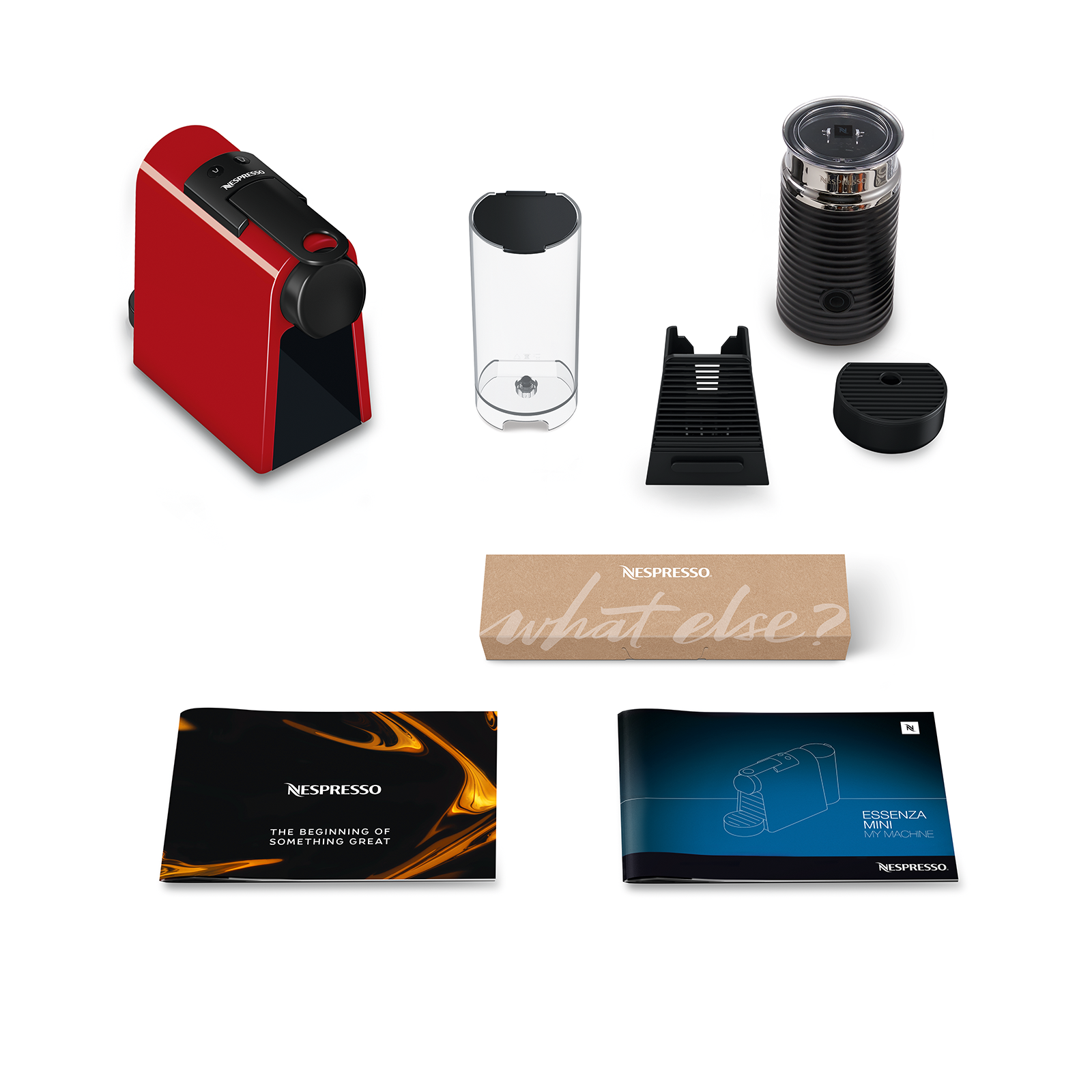 Bir Nespresso kahve makinesi kurulumu. Makine, süt köpürtücü, su kabı ve aksesuarları içerir.