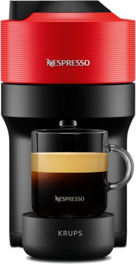 Fekete-piros Nespresso kávéfőző egy pohár kávéval. A Krups logója az alapon.