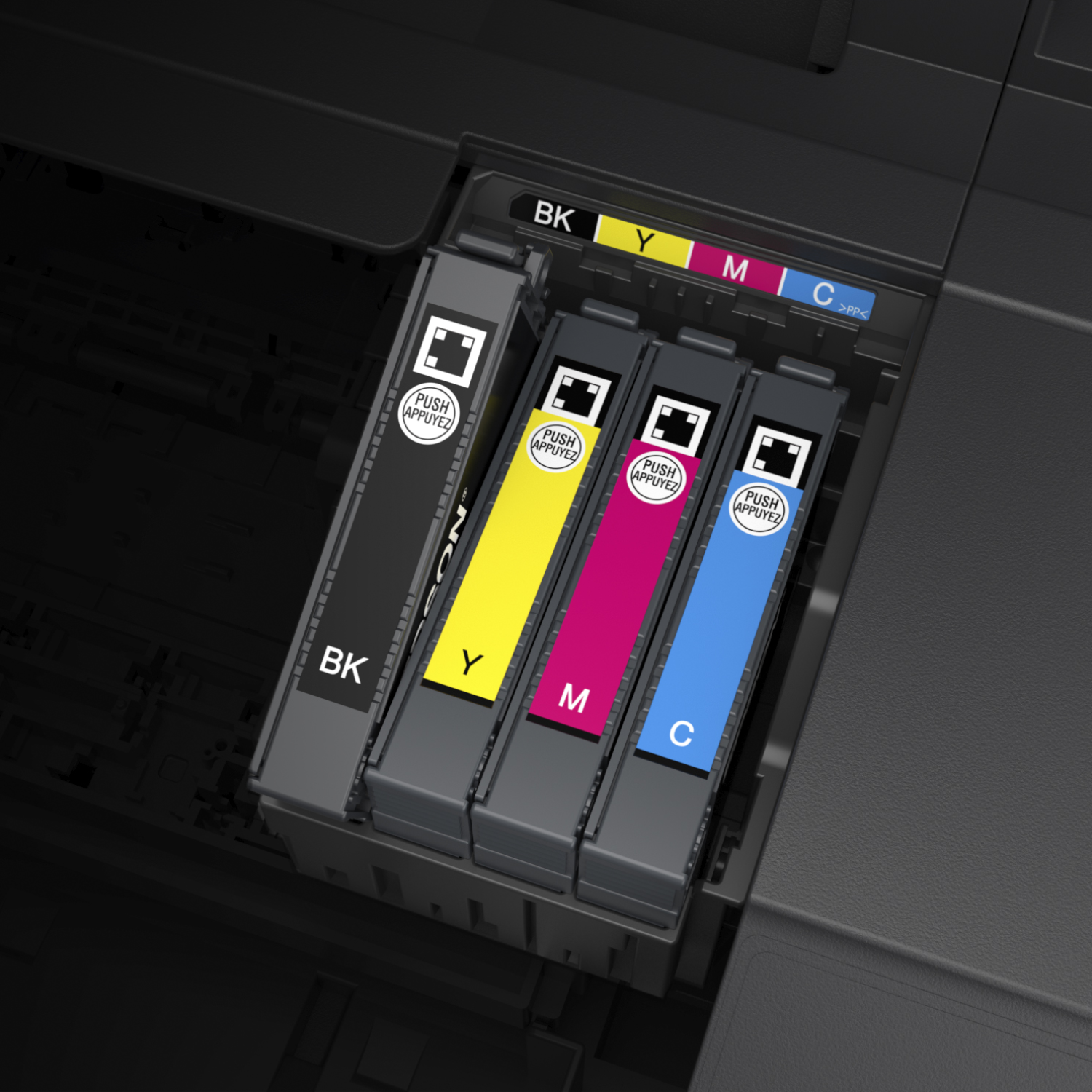 Open printercartridgecompartiment, vier inktcartridges zichtbaar: zwart, geel, magenta en cyaan.