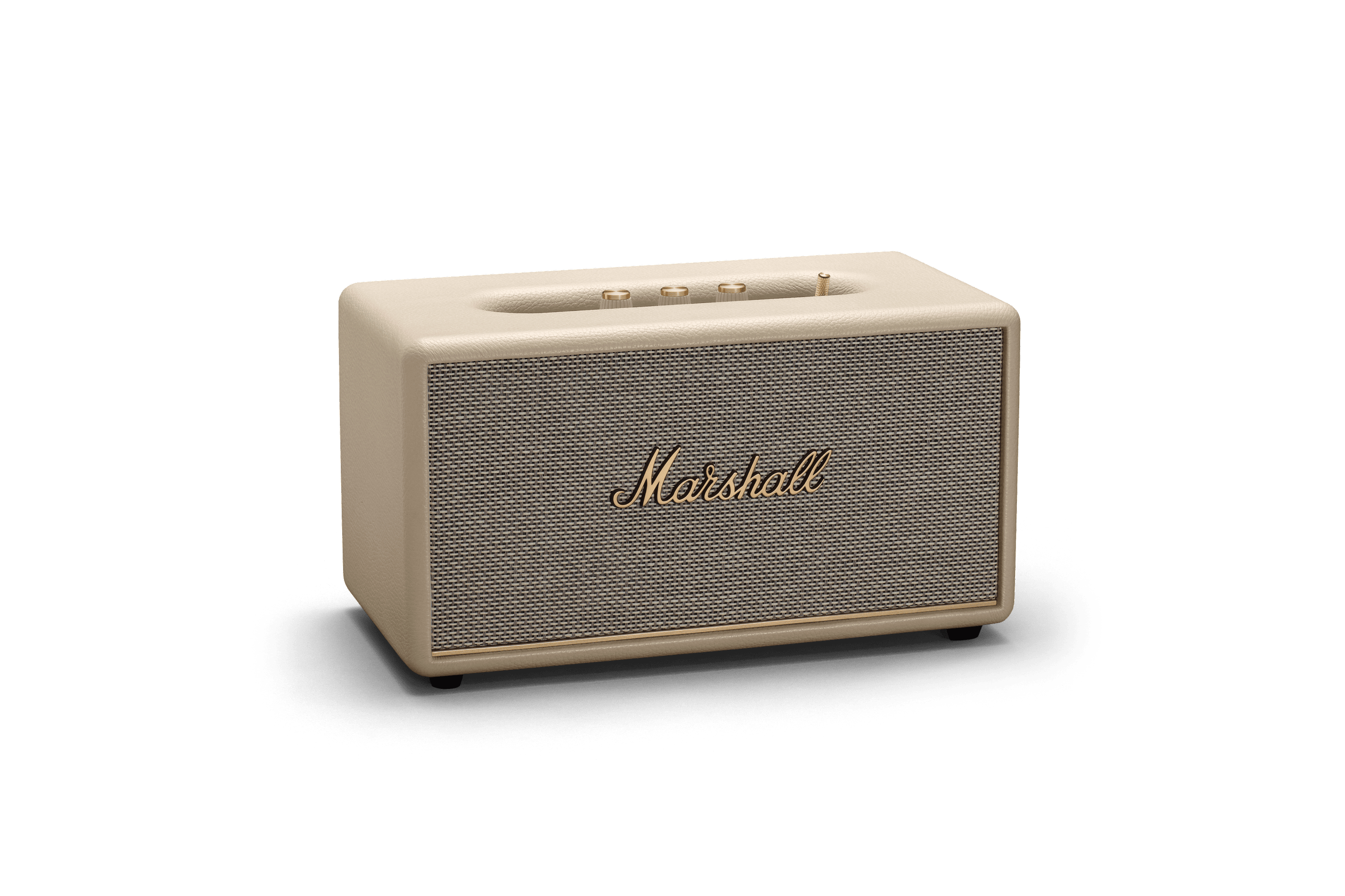 Beiger Marshall-Lautsprecher auf weißer Oberfläche. Es hat das Marshall-Logo und ein graues Lautsprechergitter.