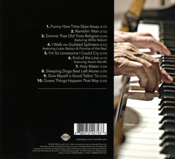 Ein CD-Albumcover mit handgeschriebenen Texten und den Händen einer Person, die Klavier spielt.