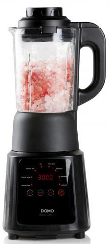 Black blender with a glass jar filled with pink chopped ice.