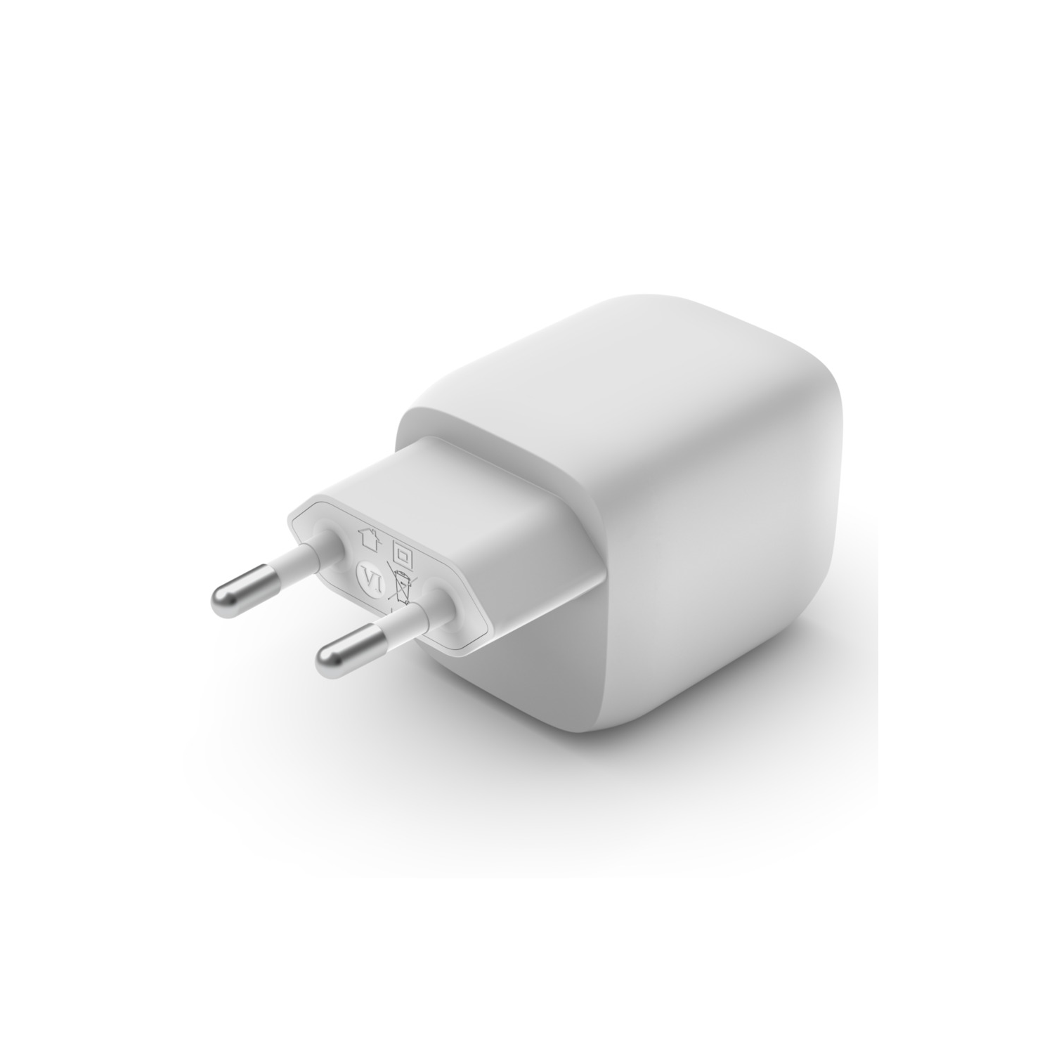White power adapter with two prongs, angled on a white surface.