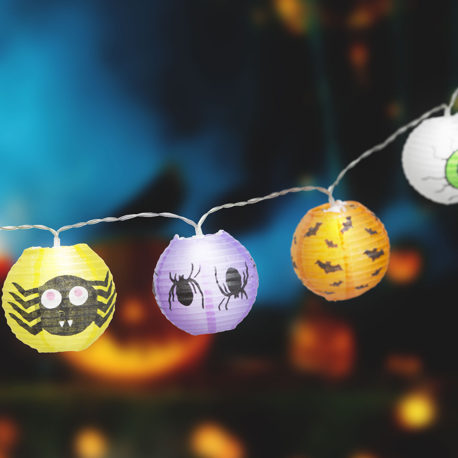 Halloween-i füzér, pókokkal és szemekkel.
