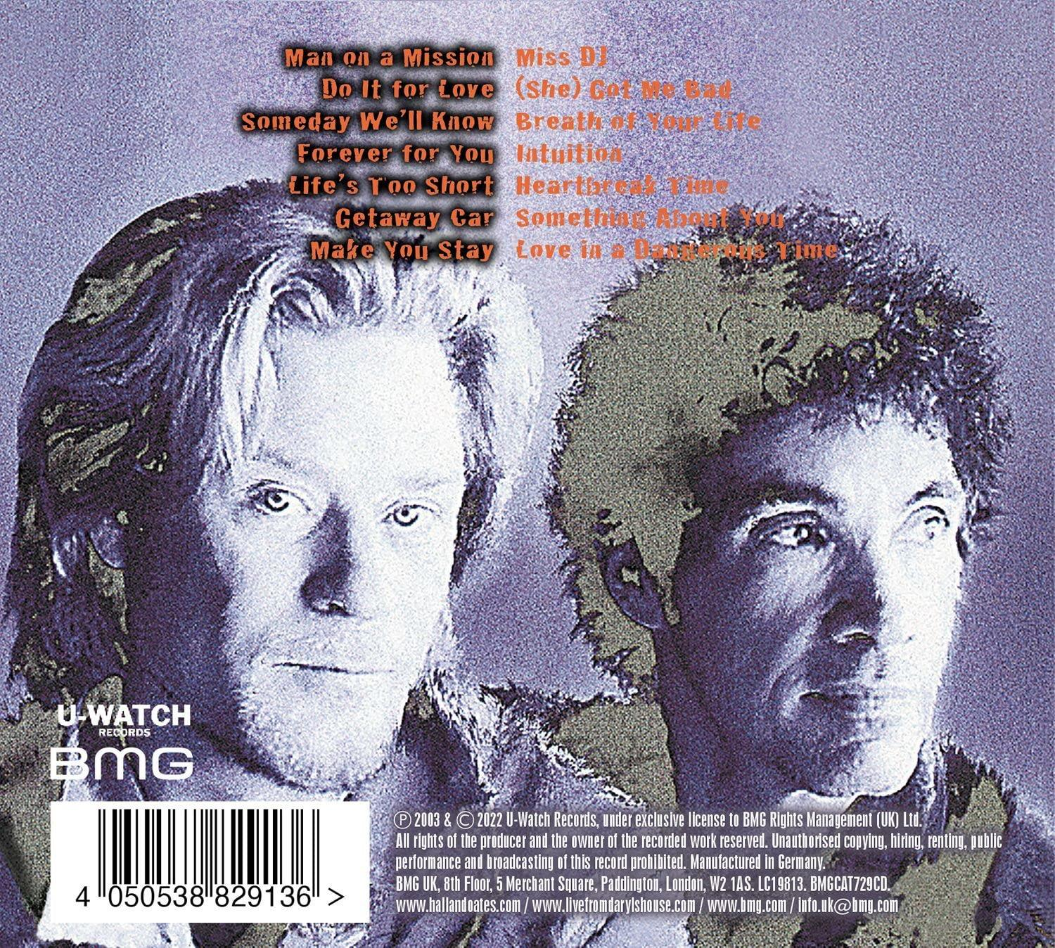 Albumhoes met twee gezichten van mannen. Titels van nummers links. U-Watch Records logo.