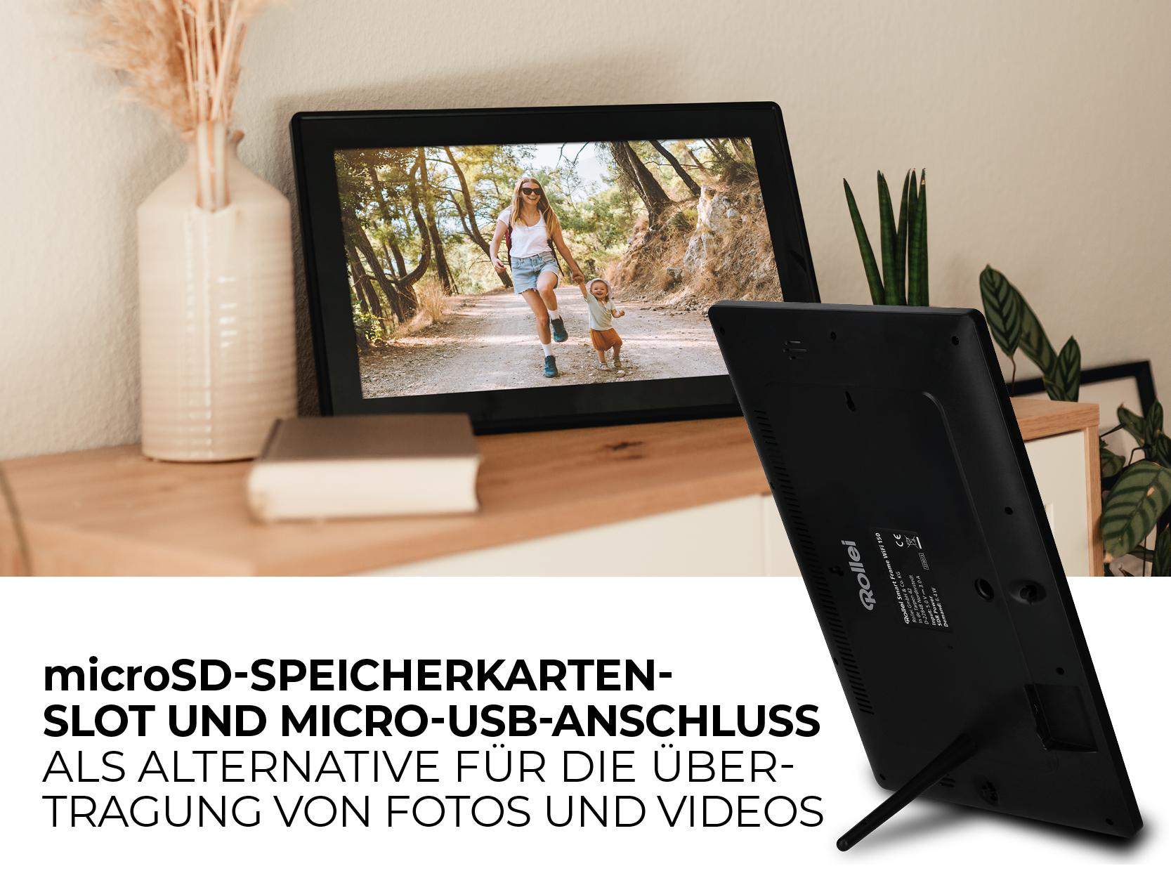 Ein digitaler Fotorahmen, der ein Foto von Mutter und Kind zeigt, auf einem Tisch.