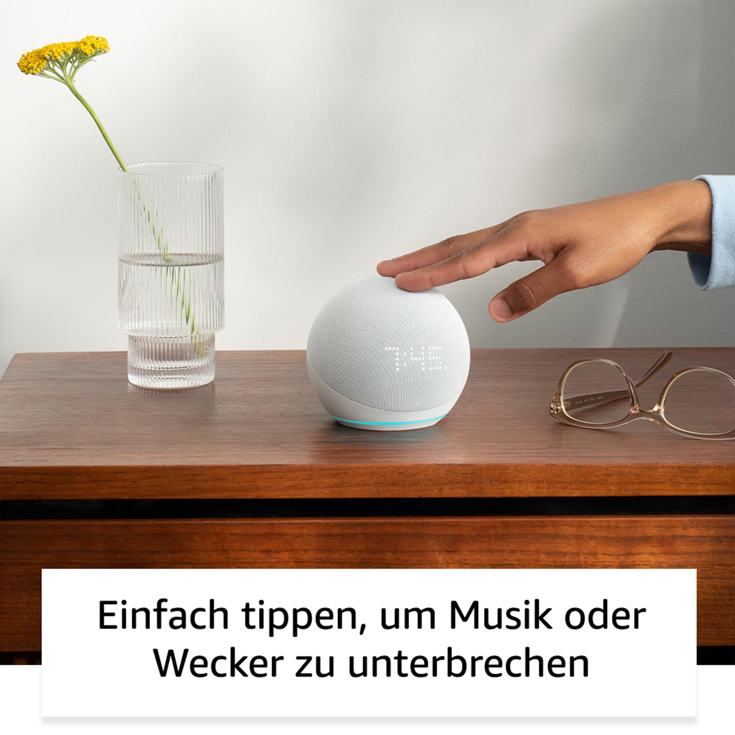 Person berührt weißen Smart-Lautsprecher. Text: 'Einfach tippen, um Musik zu pausieren'.