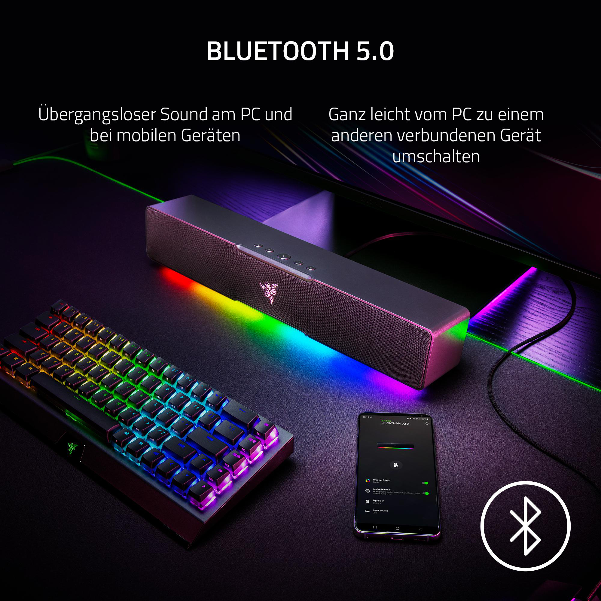 Schwarze Soundbar mit Regenbogenbeleuchtung, eine Tastatur, ein Telefon und Bluetooth 5.0-Text oben.