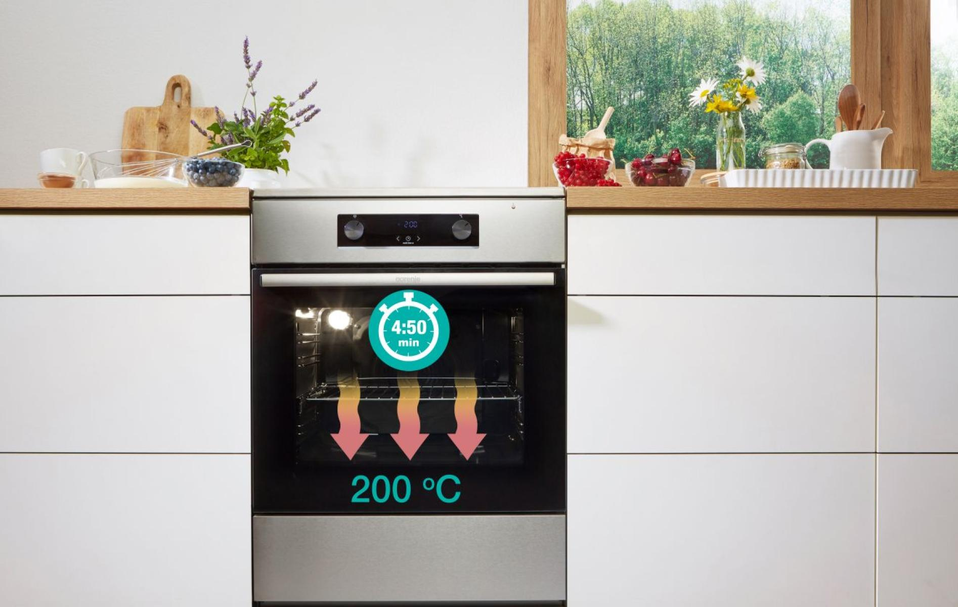 Ein Ofen mit Timer und Temperaturanzeige, der den Kochvorgang zeigt.