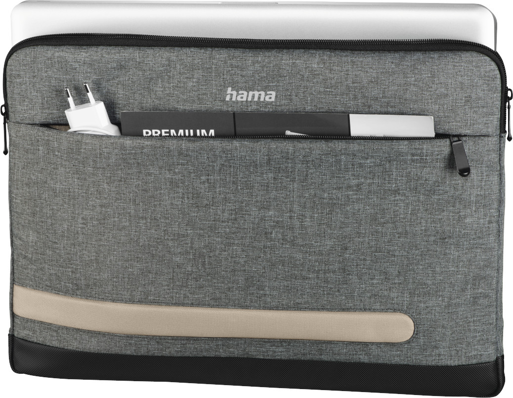 A gray laptop sleeve with a charger and pen in the front pocket.