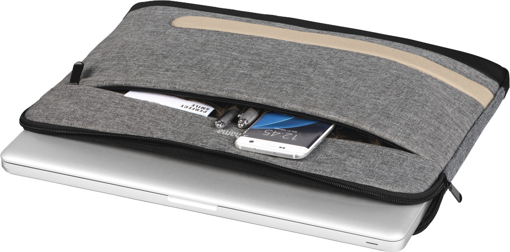 A gray laptop sleeve with a zipper and a pocket containing pens and a phone.